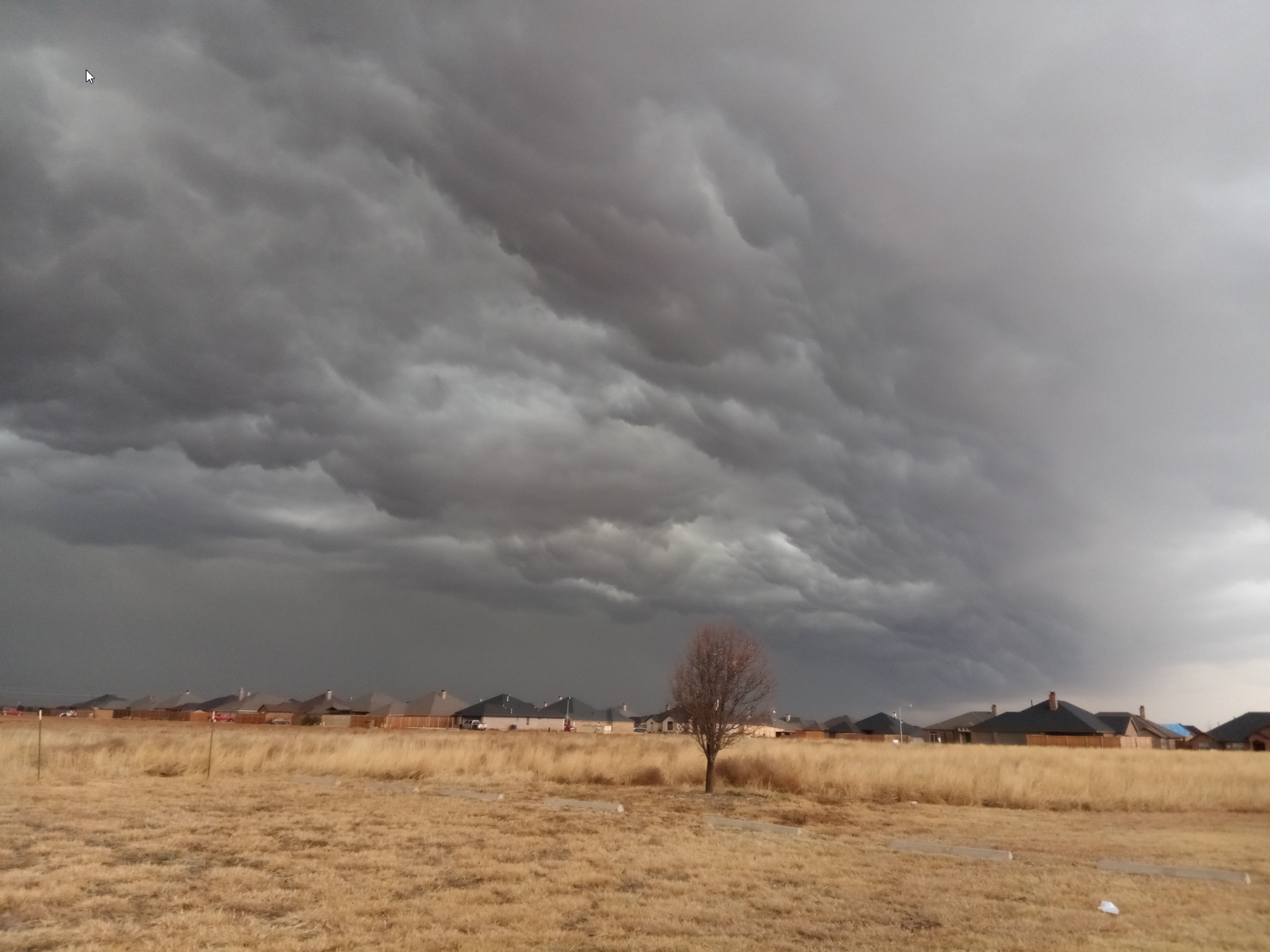 Leading edge of a line of thunderstorms moving into Lubbock around 2 pm on Wednesday, 26 December 2018.