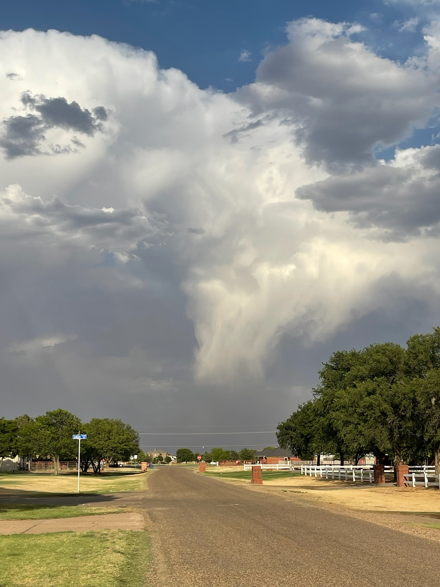 View of a high-based shower as it is approaching Slaton Tuesday evening (17 May 2022). The image is looking east and is courtesy of John Lipe. 