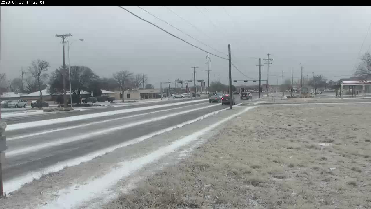 Light wintry precipitation coating the ground in Lubbock at University and 74th Street Monday morning (30 January 2023). The image is courtesy of the City of Lubbock.