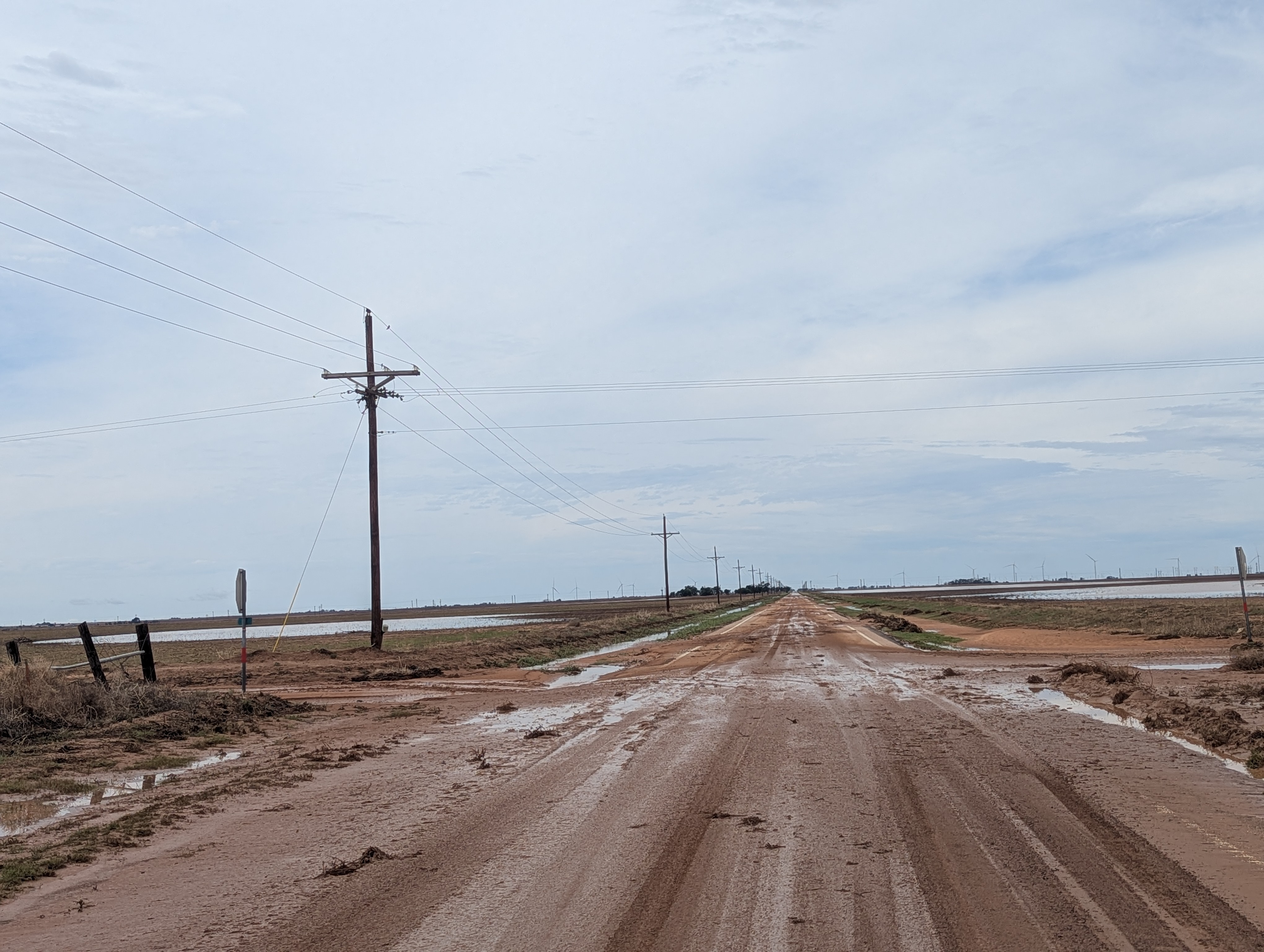Muddy roadway in northeastern Lynn County on Wednesday (3 June 2026). The picture was taken along FM 212 about 2 miles north of Highway 380.